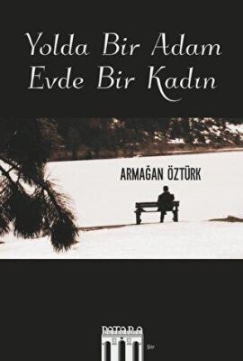 Yolda Bir Adam Evde Bir Kadın kapağı